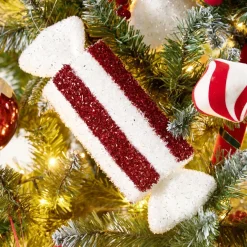 Bonbon de Noël géant brillant rouge et blanc à suspendre L25cm (2 modèles)