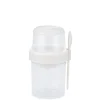 Boîte alimentaire ronde 530ml avec cuillère et compartiment plastique Ø11xH18cm (2 modèles)