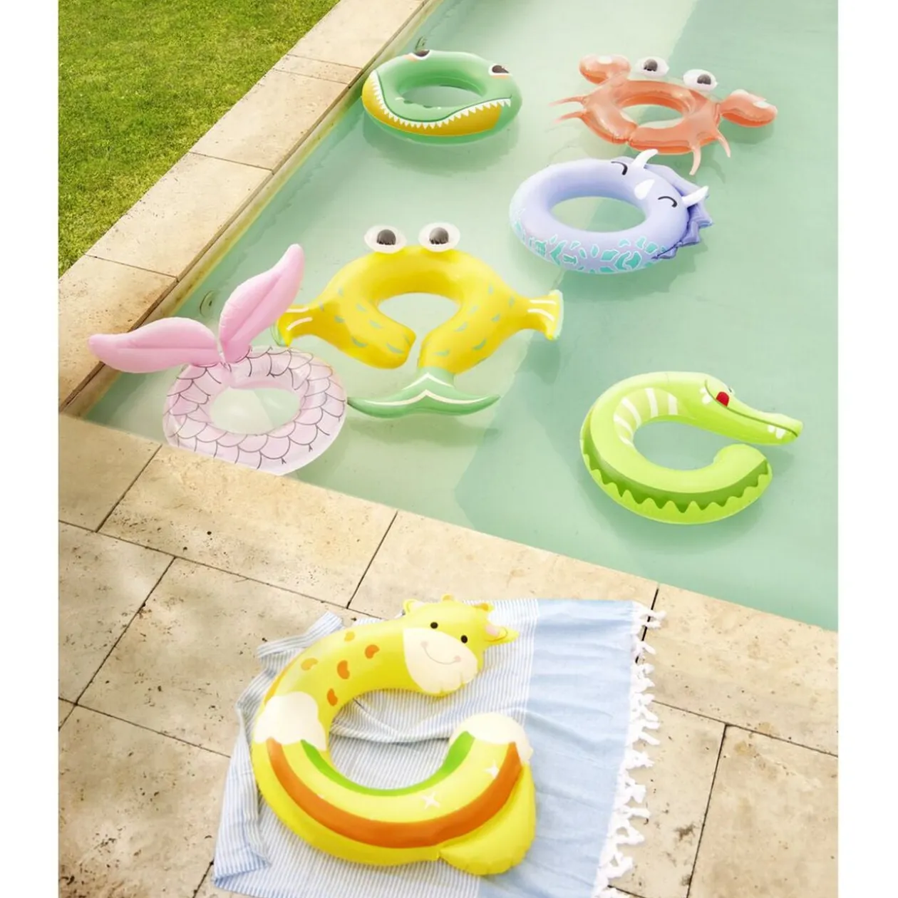 Bouée ronde en plastique ouverte design girafe jaune Ø65cm