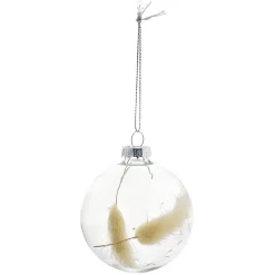 Boule de Noël en verre avec feuille séchée