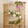 Chute orchidée rose L74cm feuillage artificiel vert