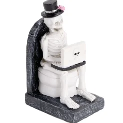 Décoration Halloween squelette sur WC résine noir et blanc 6x8xH13cm