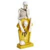 Décoration à poser Halloween squelette sur tombe H21,5cm (2 modèles)