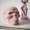 Décoration velours Halloween tête de mort pastel rose 12x11xH16cm < Gifi Outlet