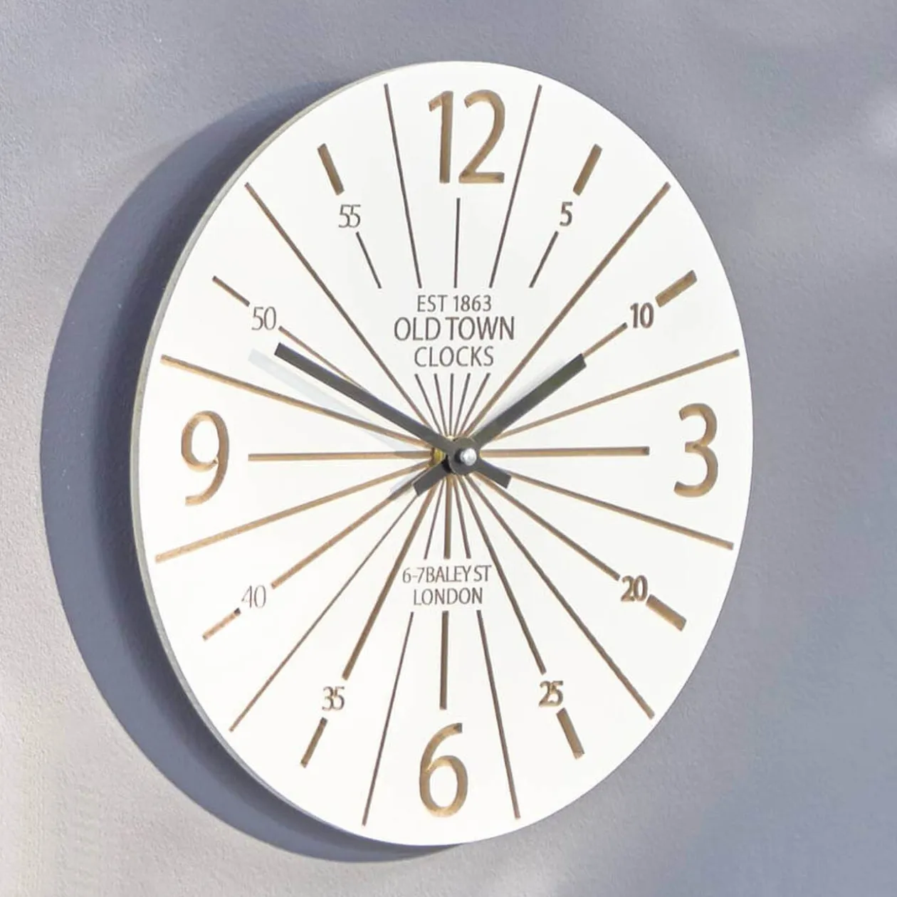 Horloge ronde design rayon effet bois blanc naturel Ø30 cm