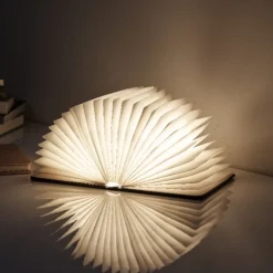 Lampe livre pliante noir, gris ou rose