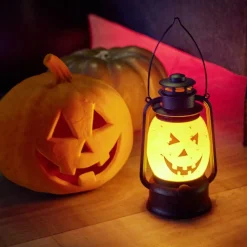 Lanterne LED Halloween tête citrouille orange et noire Ø12xH20,5cm