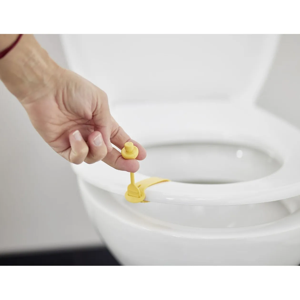 Lève couvercle de toilette en silicone L24cm (4 modèles)