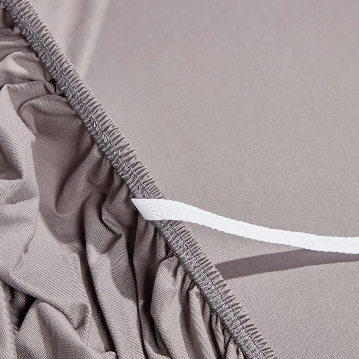 Protège canapé extensible 3 places uni gris 195 à 230 cm