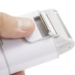 Rasoir électrique de poche avec brosse de nettoyage