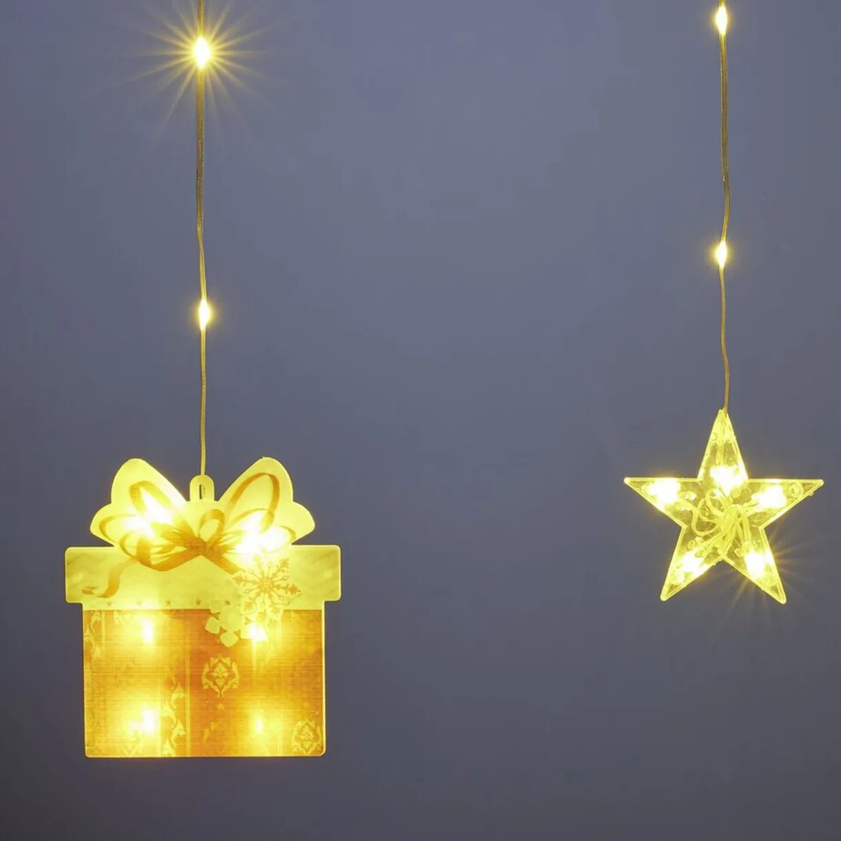 Rideau de fenêtre Noël 90LED lumineux figurines et étoiles L300cm < Gifi Online