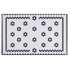 Tapis vinyle rectangulaire motif carreau de ciment fleur blanc et noir 38x60cm
