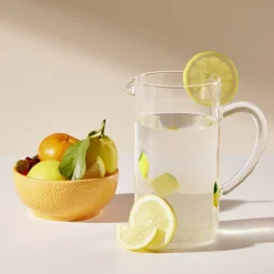 Verre bas transparent motif relief citron jaune Ø9xH10cm