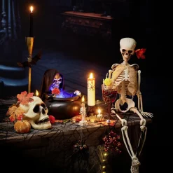 Verre à pied Halloween main squelette H18cm (2 modèles noir ou violet) < Gifi